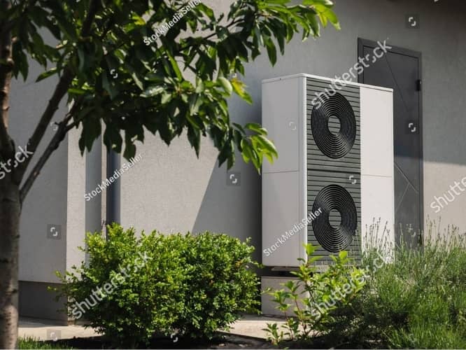 Outdoor AC unit next to a wall